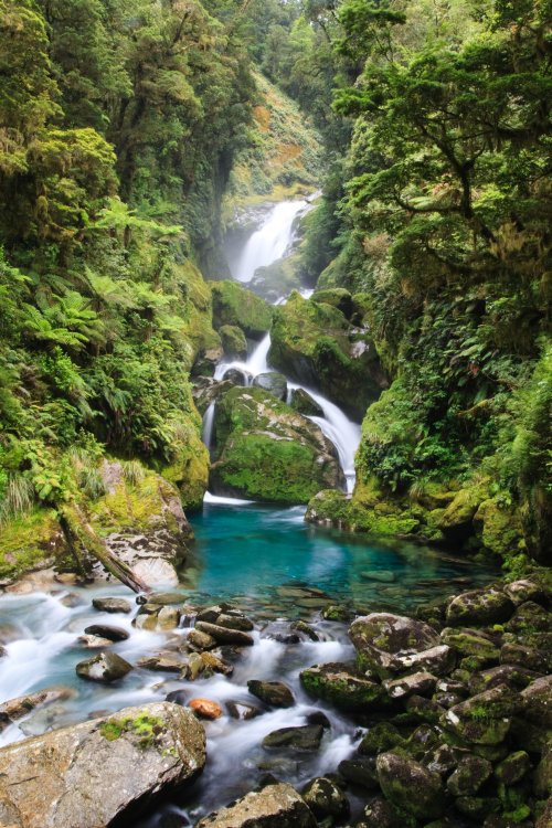 Waterfall in turquoise stream Operatunity Travel